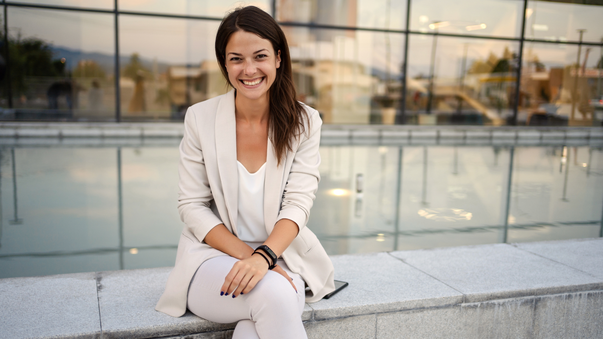 Business woman smiling after fibroid removal treatment at Phase II center for women's health