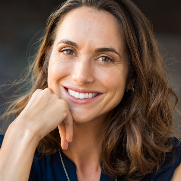 Smiling patient after a successful menopause treatment from Phase II Center for Women's Health