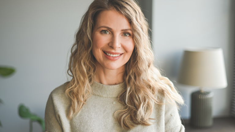 Female patient smiling after her Prolapse Consultation at Phase II Center for Women's Health in Millcreek, UT