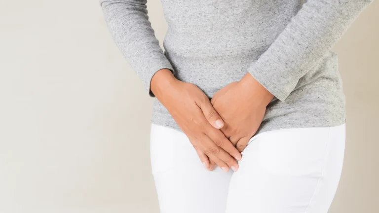 Millcreek, Utah Phase 2 Women patient experiencing urinary incontinence symptoms, holding her lower abdomen before seeking treatment.